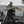 Load image into Gallery viewer, Michael Hiller fishing, holding a pike from a boat.