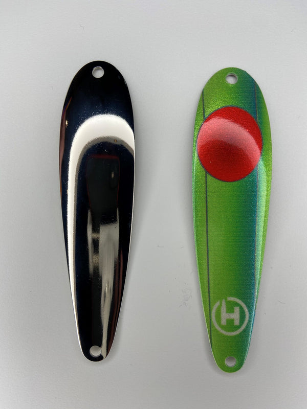 Two fishing spoons. Custom fishing lures for Cisco. Fishing spoons for Lake Herring. Custom, green fishing lure that fades to turquoise with a large, red circle near the top.