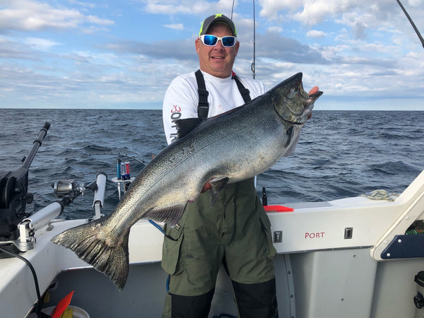 A charter boat in Manistee with a Salmon catch.