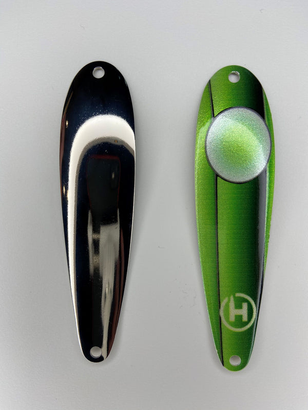 Fishing lures. Custom fishing spoons for Cisco or Lake Herring. Custom, green fishing lure with a green stripe down the center that fades to black, and a white circle with a chartreuse center near the top.