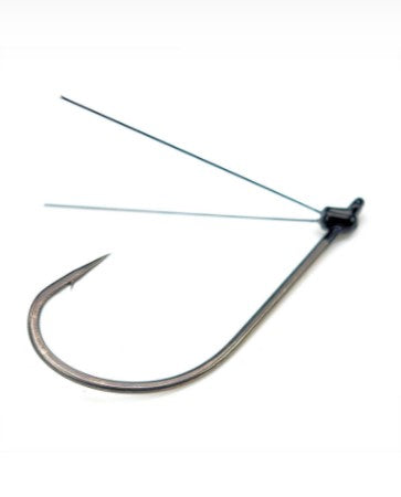A single barbed hook with two weedless guards nearest the eyelet angling towards the hook's point.